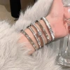 This simple and elegant white mother-of-pearl bracelet for women, set with diamonds and made of titanium steel, is fashionable, versatile, super shiny and does not fade. It is a light luxury jewelry details Picture